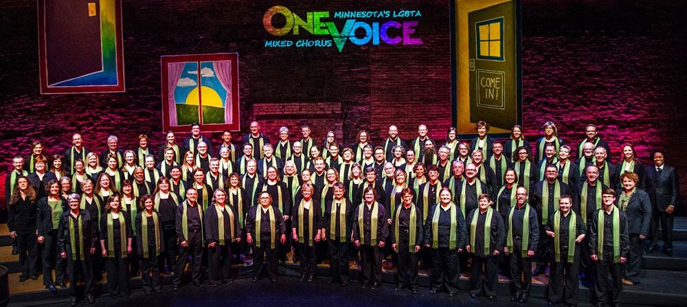 One Voice Mixed Chorus stands on a stage