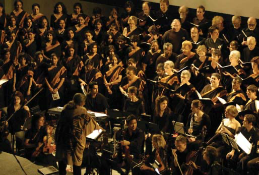A large choir performs a song