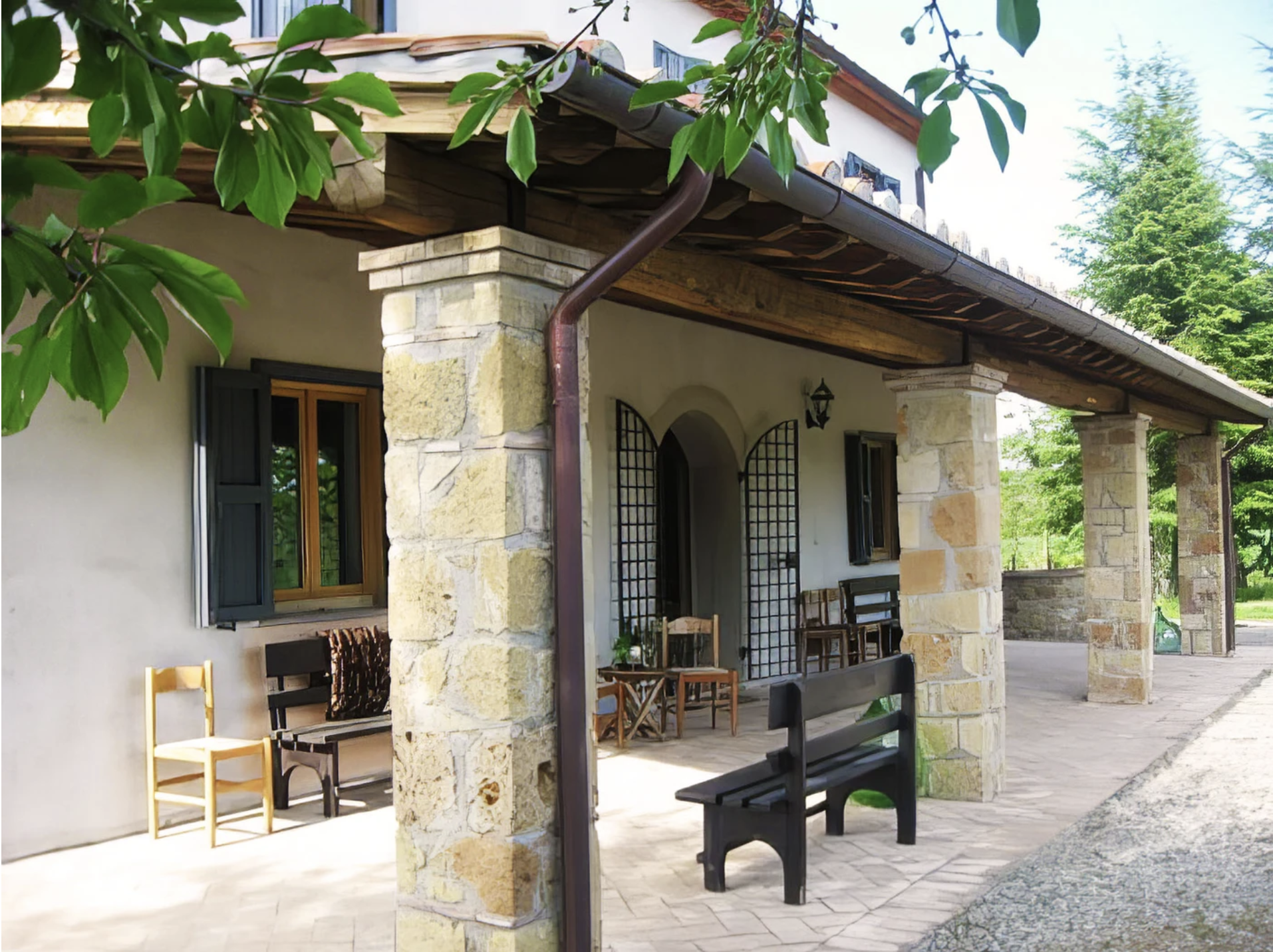 an outdoor patio at a beautiful tuscan villa