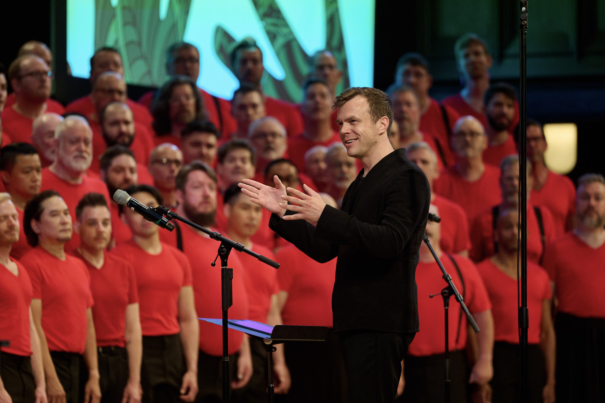 Jacob Stensberg conducts the San Francisco Gay Men's Chorus at Festival 2024.