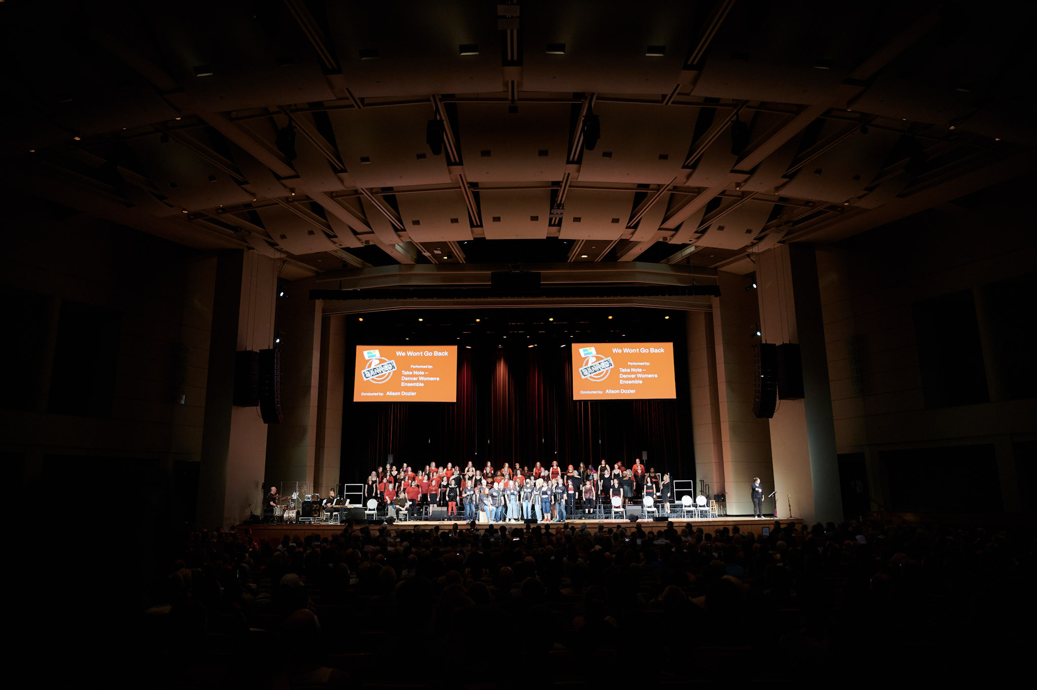 A choir performs on the Minneapolis Convention Center Stage at Festival 2024.