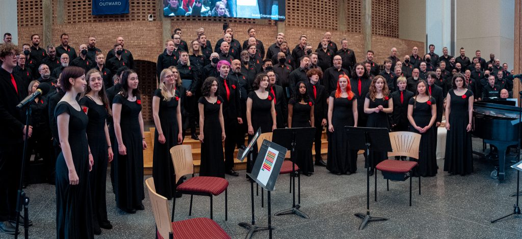 The Twin Cities Gay Men's Chorus sings with students from Minneapolis Central High School.